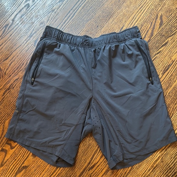 E.   Tommy John dark grey elastic waist vented technical fabric shorts. Large. - Picture 1 of 7